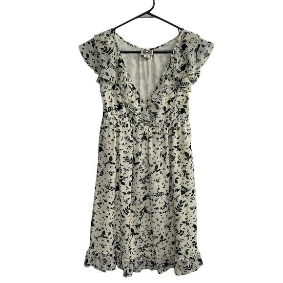 Converse Dresses & Skirts - Soft Girl Floral Ruffle Dress Converse One Star Ivory Black Size S